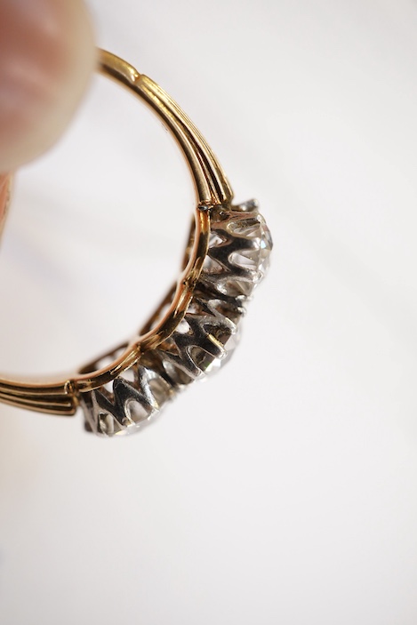 An attractive three-stone diamond ring, early 20th century